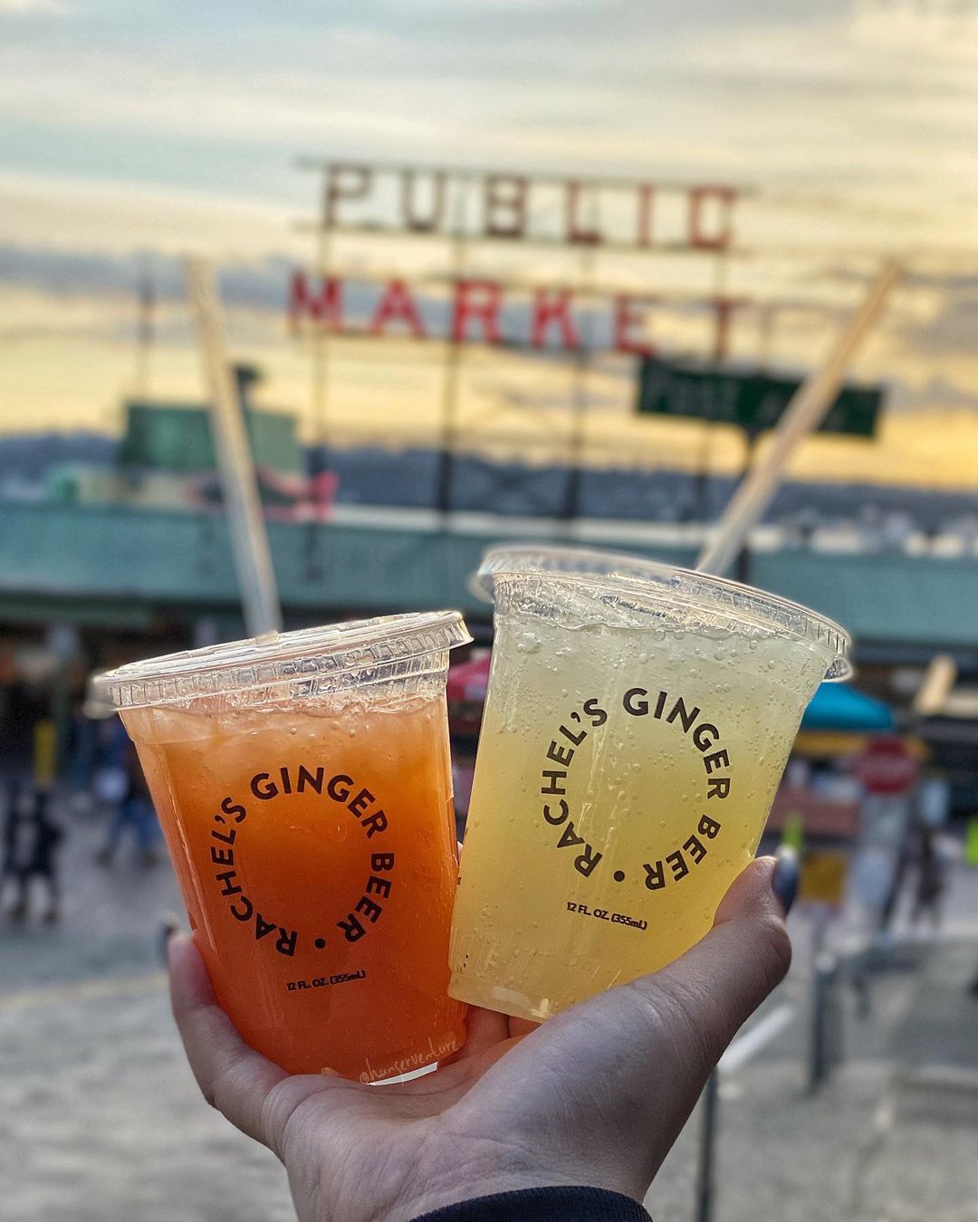 drinks in front of sign
